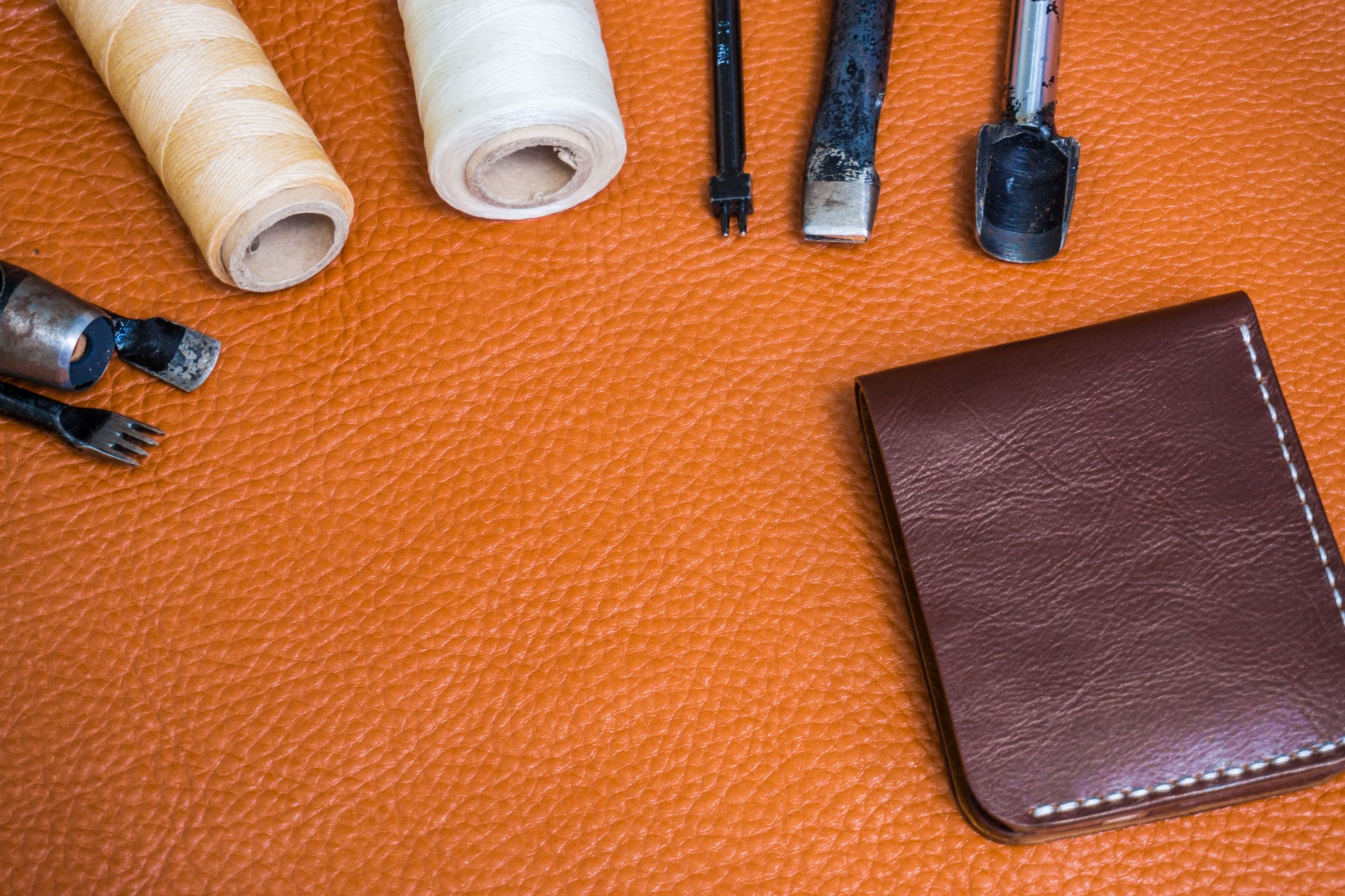 Leather craft for wallet working with tool on leather craftman's
